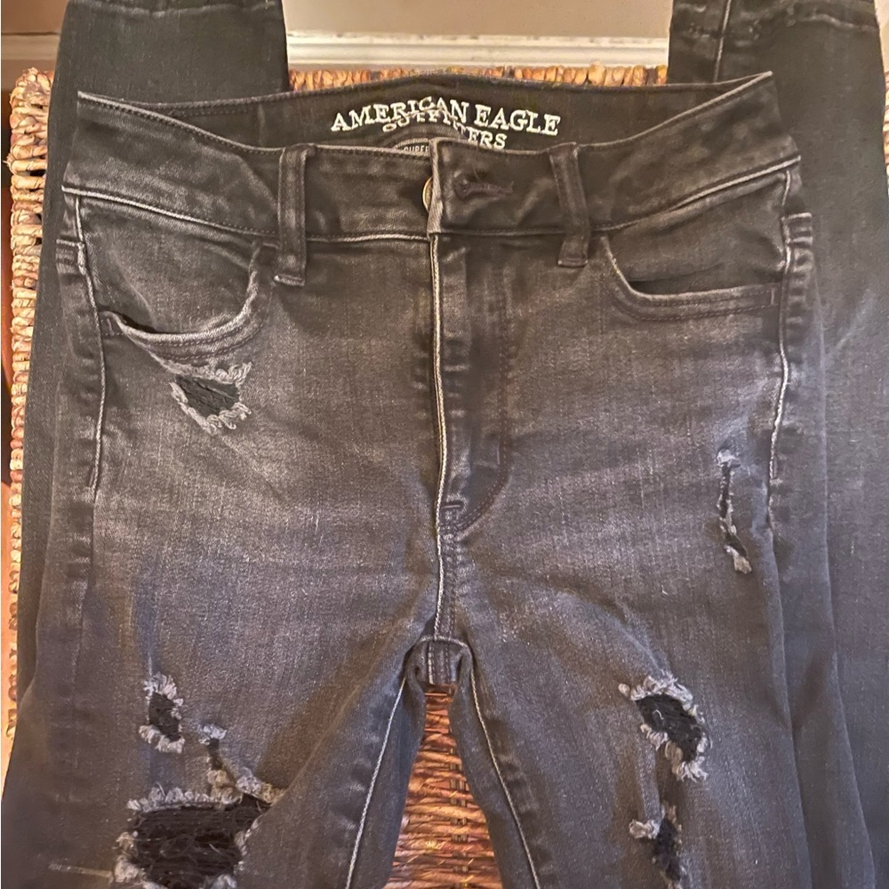 Black distressed skinny jeans